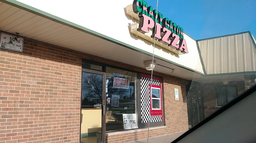 Crazy Gator Pizza entrance with the iconic sign